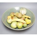 A collection of vintage Penkridge ceramic fruit including a pomegranate, melon, two bananas,