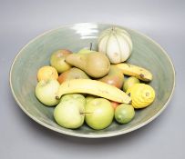 A collection of vintage Penkridge ceramic fruit including a pomegranate, melon, two bananas,