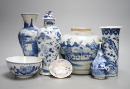 Twelve pieces of 19th century Chinese blue and white tableware and a small famille rose bowl,