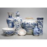 Twelve pieces of 19th century Chinese blue and white tableware and a small famille rose bowl,