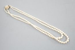 A double strand graduated cultured pearl necklace, with a 9ct and cultured pearl set clasp, 44cm.