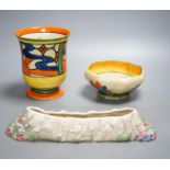 A Clarice Cliff Fantasque vase and two other Clarice cliff items