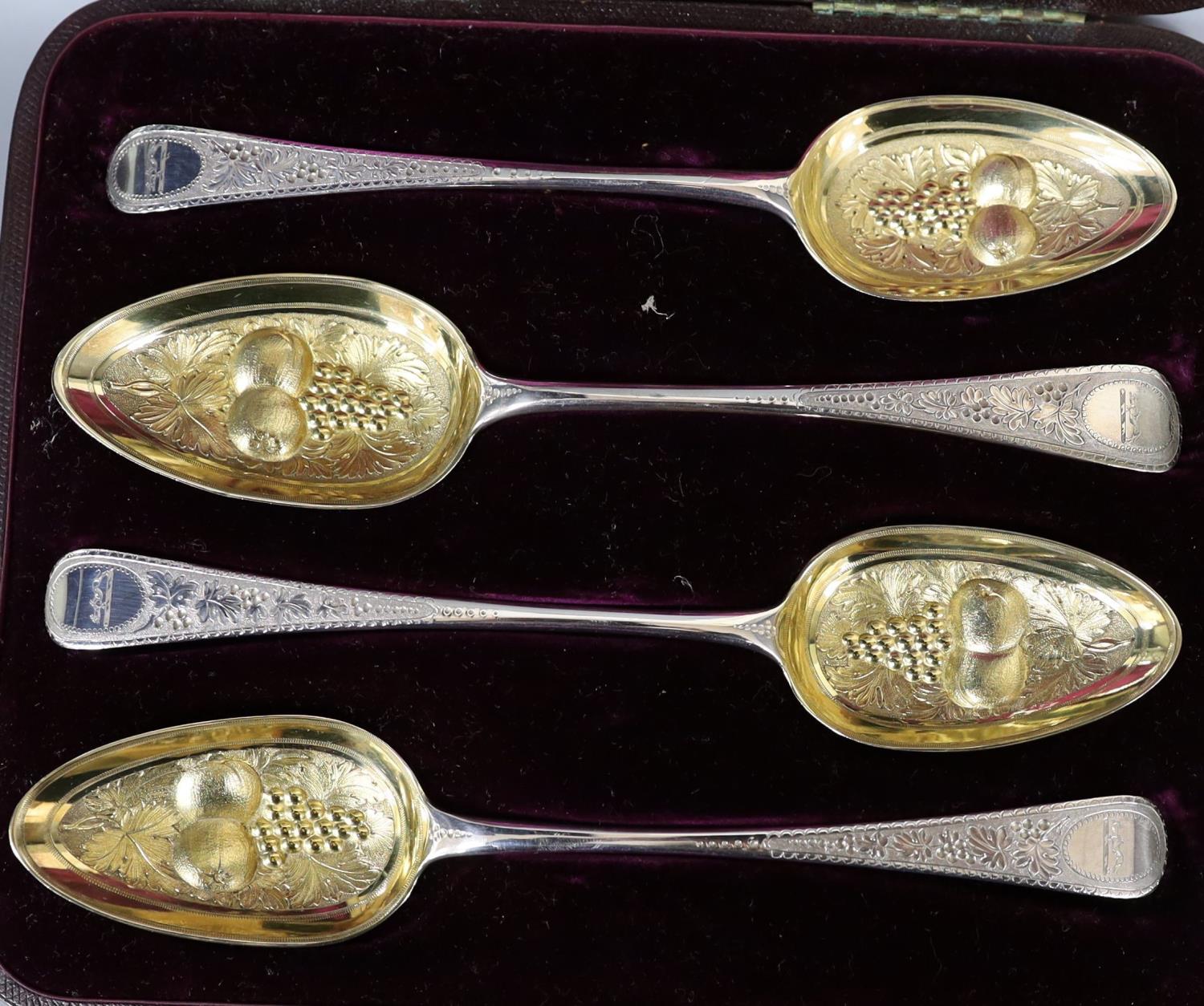 A cased matched set of four 19th century parcel gilt berry spoons, 7.5oz - Image 2 of 3