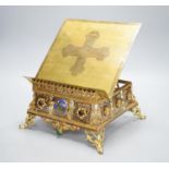 A 19th century gilt brass bible stand