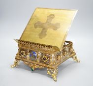 A 19th century gilt brass bible stand