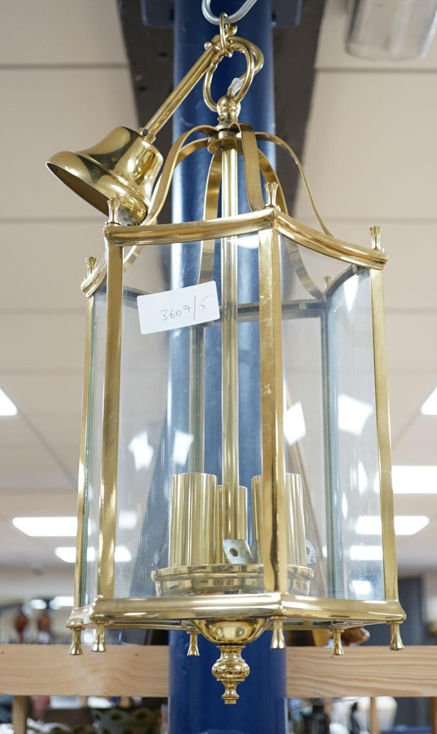A brass hanging hall lantern