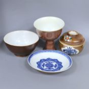 A Chinese cafe au lait glazed saucer, three bowls and a stem cup