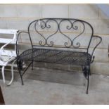 A metal folding garden bench, length 135cm, depth 46cm, height 96cm