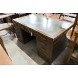 An early 20th century oak pedestal desk, length 152cm, depth 90cm, height 78cm