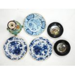 A group of 18th century delftware plates, Wedgwood majolica candlestand (a.f.) and two Victorian