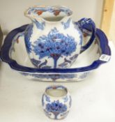 A Doulton Burslem "Tudor" pattern pottery toilet jug, basin a toothbrush vase, af (3)