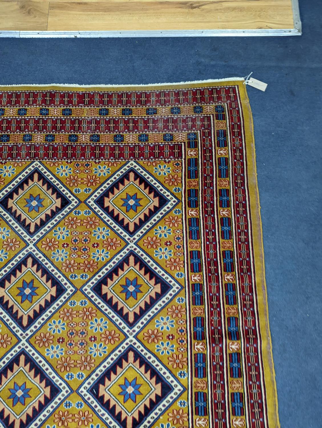 A Caucasian style gold ground rug, 190 x 124cm - Image 4 of 5