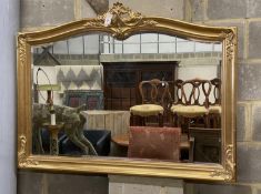 A Victorian style gilt framed overmantel mirror, width 128cm, height 98cm