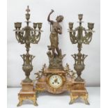 A French onyx and spelter figural clock garniture 66cm