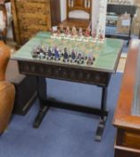 A Tower of London boxed/cased chess set, table width 80cm, depth 55cm, height 75cm