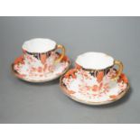 Eleven Royal Crown Derby porcelain Imari pattern 2712 coffee cups and twelve saucers