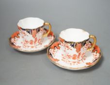 Eleven Royal Crown Derby porcelain Imari pattern 2712 coffee cups and twelve saucers