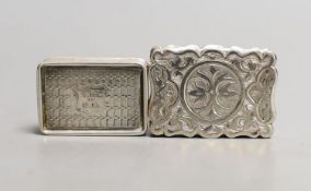 A Victorian engraved silver vinaigrette, D & M, Birmingham, 1876, 35mm and a smaller earlier