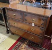 An Edwardian walnut chest of drawers, stamped Maple & Co., width 107cm, depth 36cm, height 86cm