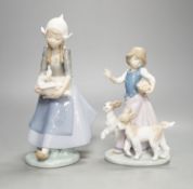 Two Lladro figure groups, tallest 26 cm