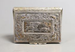 A 19th century continental gilt white metal rectangular bombe shaped snuff box, embossed with