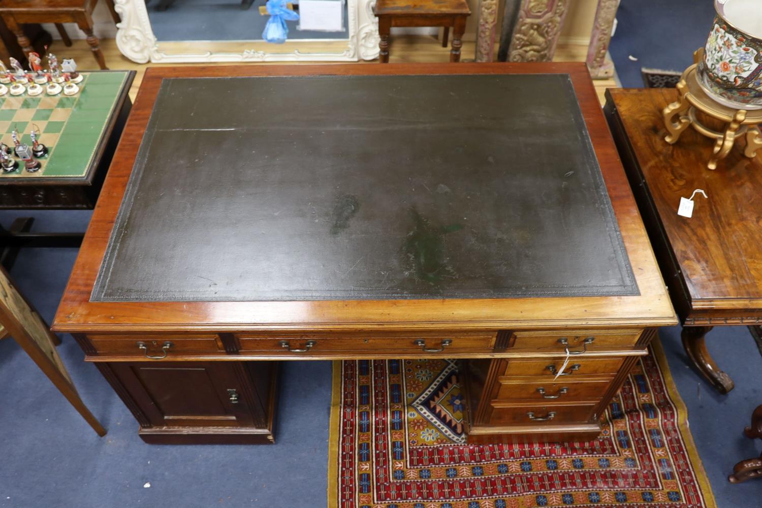 A Victorian mahogany pedestal partner's desk by Maple & Co., length 152cm, depth 105cm, height 78cm - Image 3 of 3