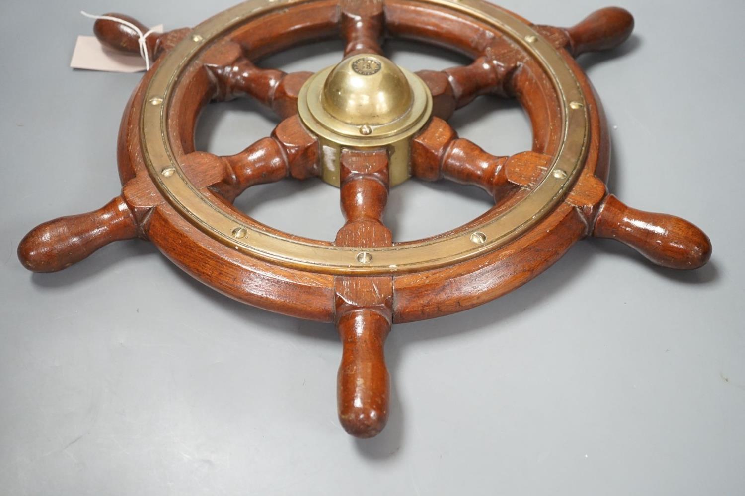 A teak and brass mounted Ship's wheel signed Lawrence Simpson 47cm - Image 5 of 5