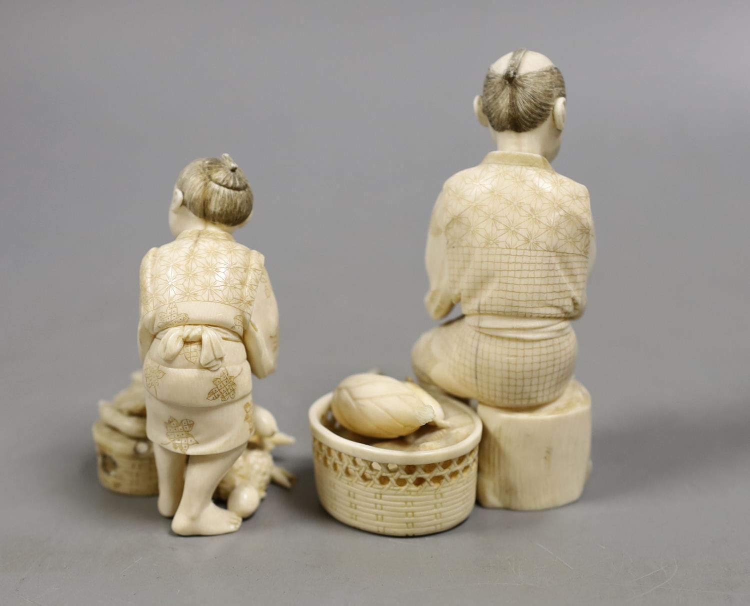 A Japanese ivory group of a farmer and boy, early 20th century,farmer 11.5 cms high. - Image 2 of 3