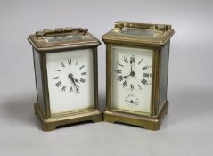 A French brass carriage timepiece with alarm and a French brass carriage timepiece,Tallest 11.5