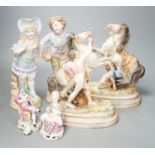 A pair of French bisque Marly horse groups and two pairs of French porcelain figures 27cm