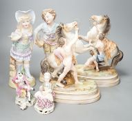 A pair of French bisque Marly horse groups and two pairs of French porcelain figures 27cm