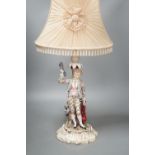 A German porcelain 'matador' lamp and shade 57cm total