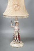 A German porcelain 'matador' lamp and shade 57cm total