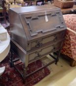 An early 20th century oak bureau, width 76cm, depth 44cm, height 100cm