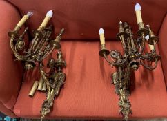 A pair of late 19th / early 20th century gilt metal six branch wall lights (converted to