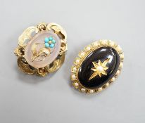Two Victorian yellow metal and gem set oval brooches, including black enamel and split pearl,