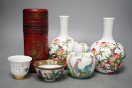 A pair of Chinese famille rose ‘peach’ bottle vases, 17cm, a ‘phoenix’ jar and cover, two