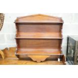 A late Victorian mahogany three tier wall shelf, width 86cm, height 86cm