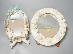 Two German porcelain easel mirrors and a Belleek easel mirror, tallest 43cm