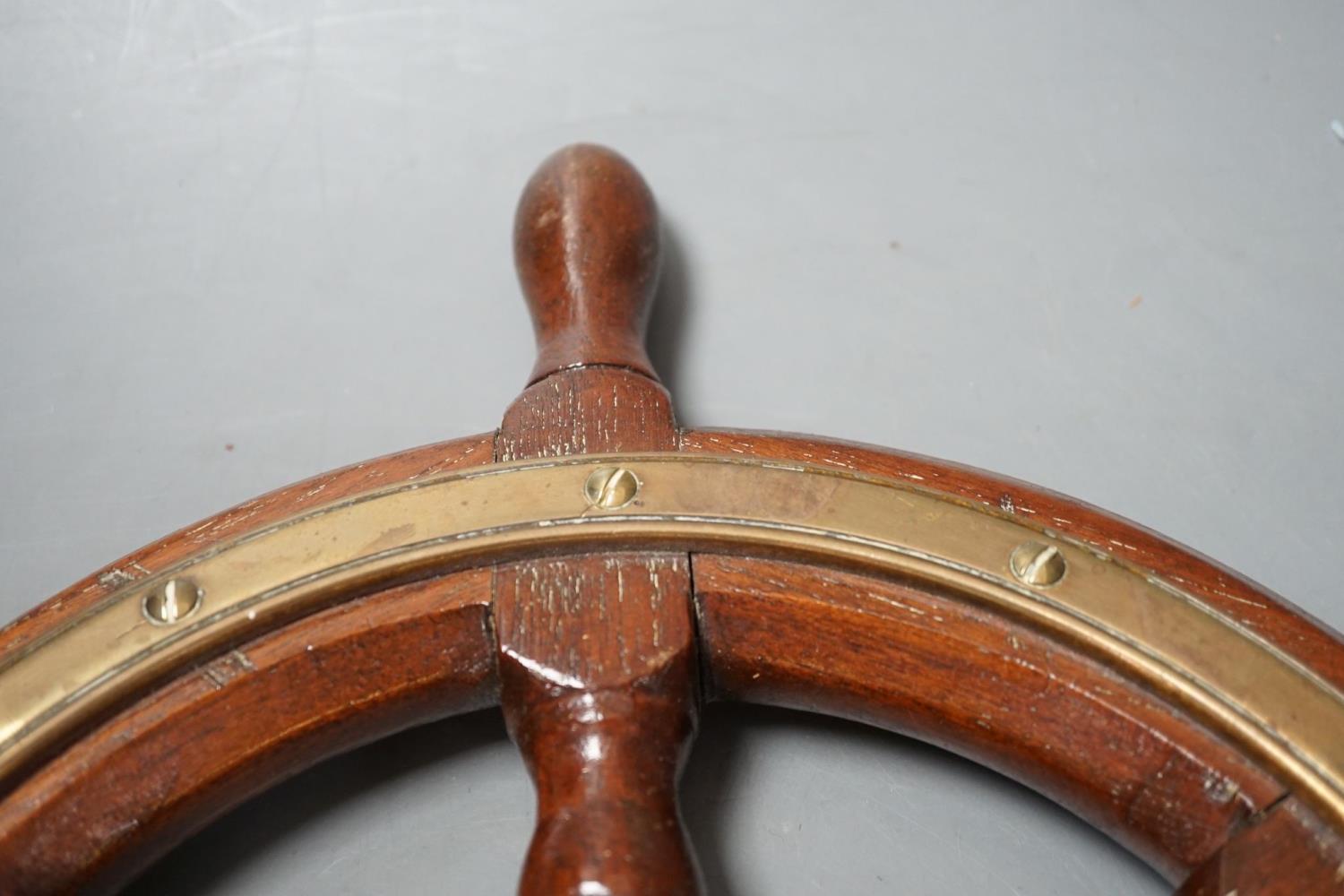 A teak and brass mounted Ship's wheel signed Lawrence Simpson 47cm - Image 3 of 5