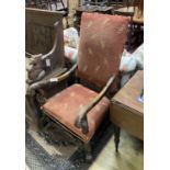 An 18th century style carved walnut elbow chair, width 64cm, depth 62cm, height 116cm