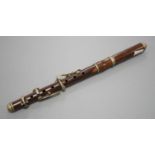 A rosewood piccolo, 32 cms long, stamped ‘for Keith Prowse Ltd. London’