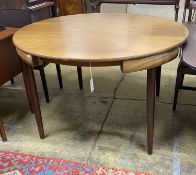 A mid century design Frem Rojle Roundette extending circular teak dining table extending circular