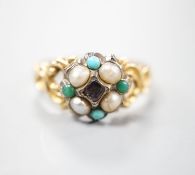 A late Victorian yellow metal, garnet, turquoise and split pearl cluster set dress ring, size M,