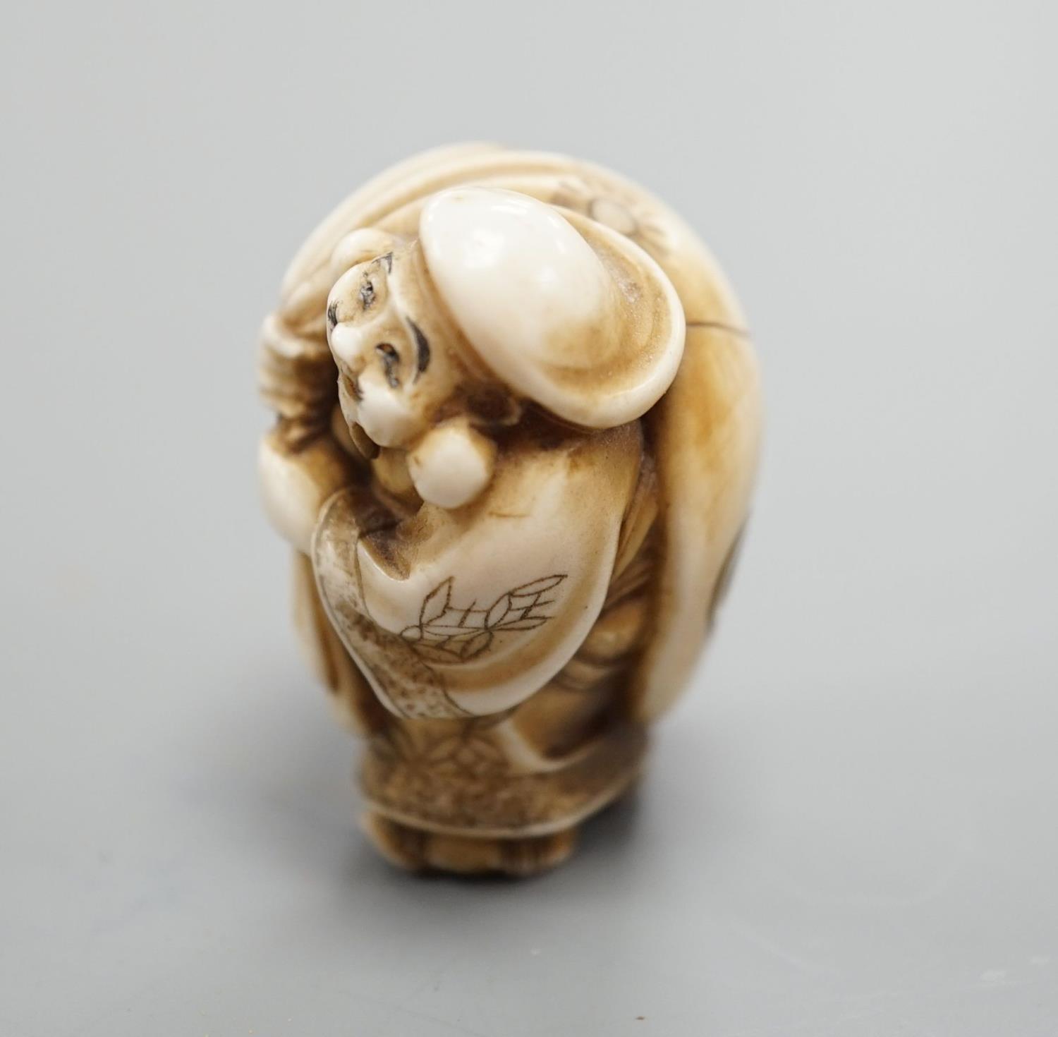 A Japanese ivory netsuke of Daikoku or Ebisu, Meiji period,4 cms high. - Image 2 of 7