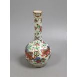 A 19th century Chinese famille rose bottle vase (dogs of fo)17 cms high.