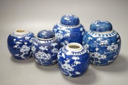 A pair of Chinese blue and white vases and eleven jars, six with covers.Vase and matching cover 28