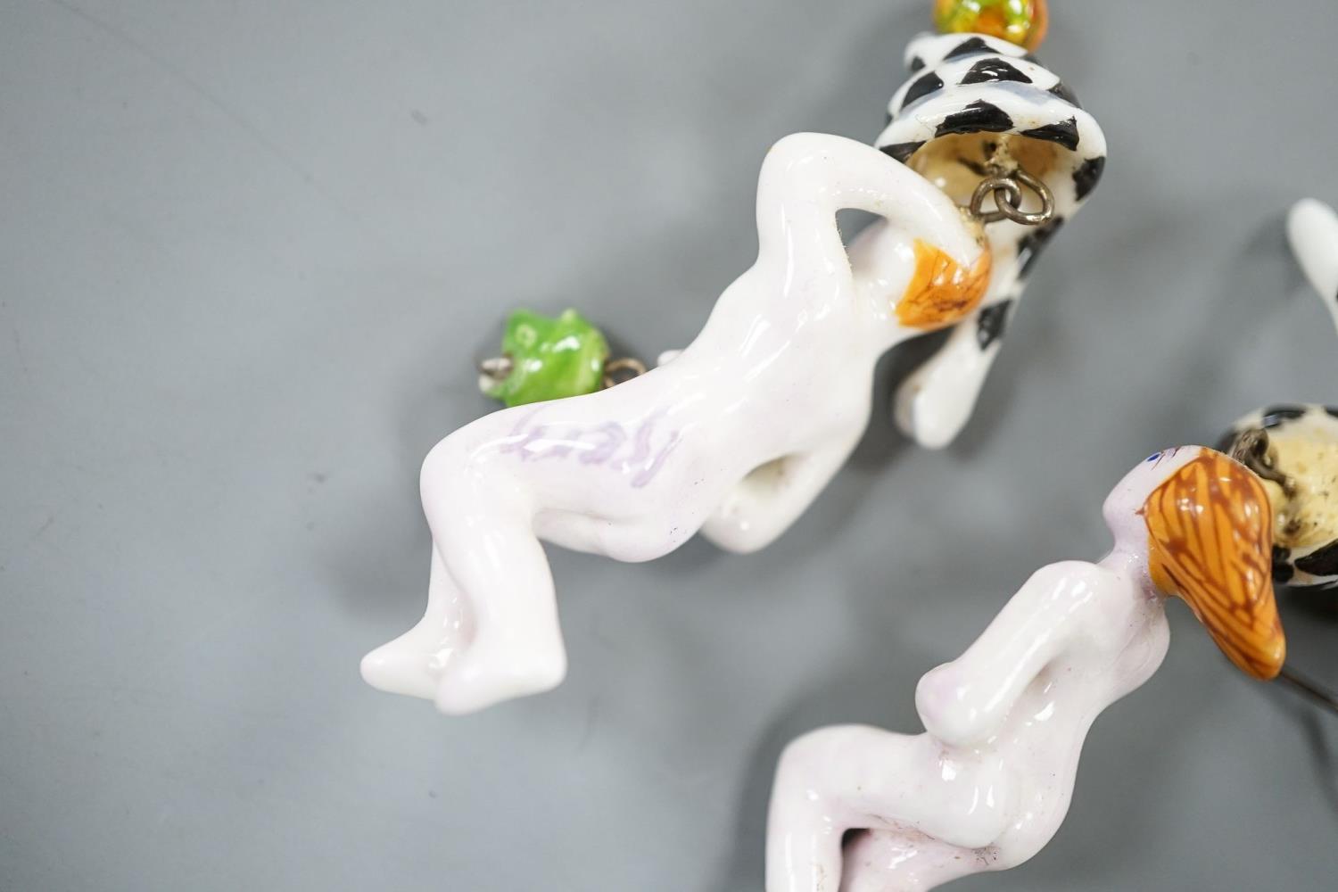 A pair of painted porcelain 'Adam & Eve with serpent' drop earrings, 62mm - Image 5 of 5