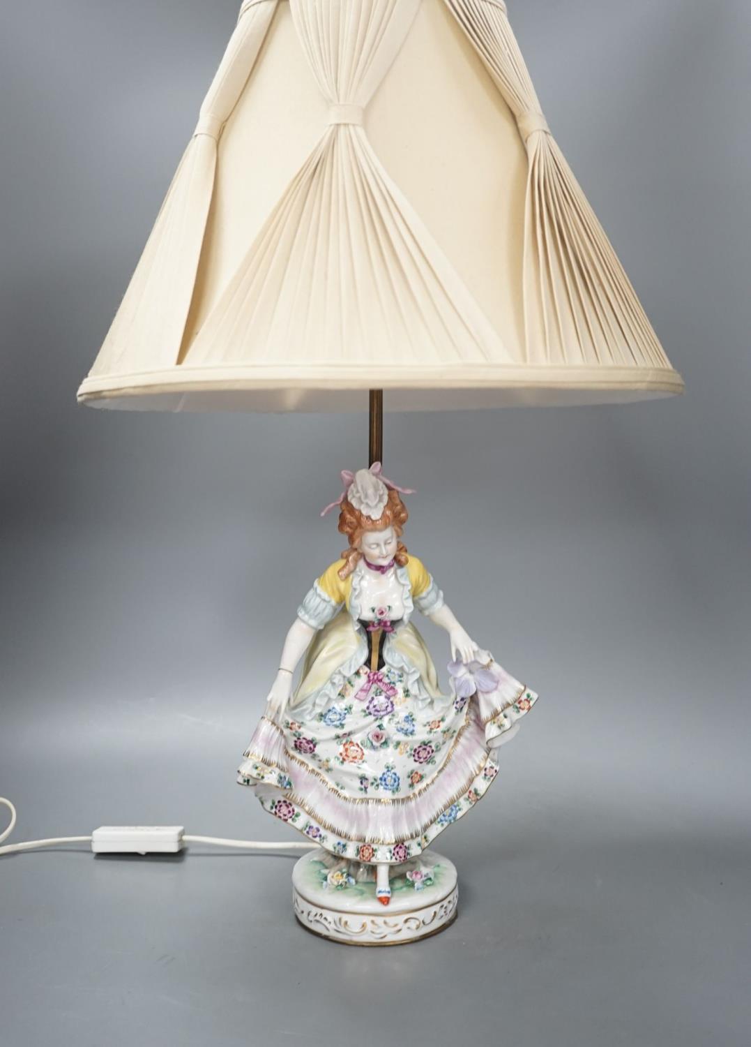 A German porcelain ‘dancing lady’ lamp