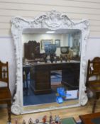 A Victorian carved giltwood and gesso overmantel mirror, later painted white, width 138cm, height